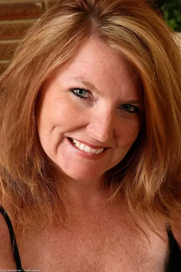 Curvy Mature Redhead Strips Out of Her Panties and Spreads