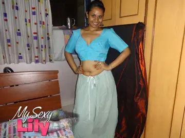 Lily Singh – Indian Brunette Reveals Her Natural Tits in a Skirt