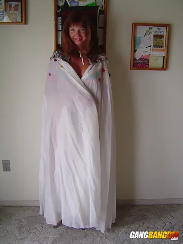 Busty Redhead MILF Sheds Her Bikini to Toy Her Pussy in Heels