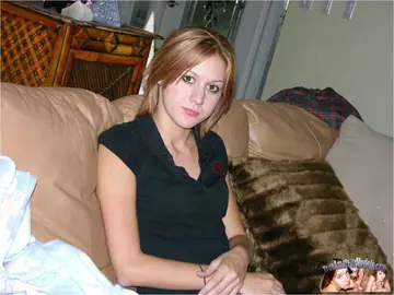 Redhead Undresses and Spreads Her Shaved Pussy and Ass