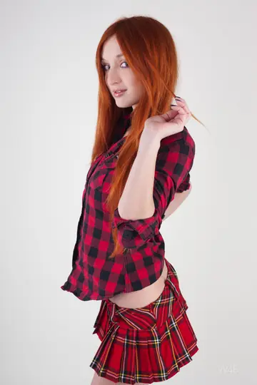 Michelle H – European Redhead Flaunts Her Big Natural Tits on a Chair