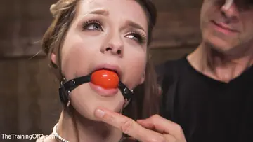 Nora Riley – Redhead Deepthroats and Gets Fucked in Bondage Group Session