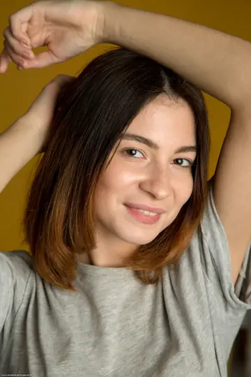 Busty Woman Strips Naked and Spreads Her Hairy Pussy