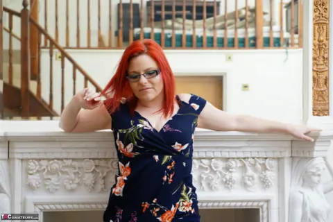 Mollie Foxxx: Mature Redhead Changes into Lingerie and Glasses – photo 4 of 16