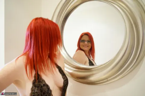 Mollie Foxxx: Mature Redhead Changes into Lingerie and Glasses – photo 12 of 16