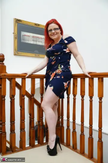 Mollie Foxxx – Mature Redhead Changes into Lingerie and Glasses