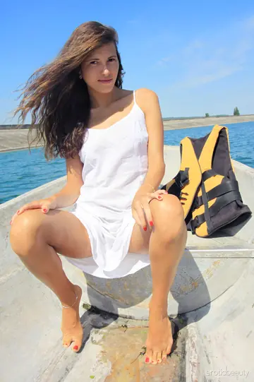 European Woman Strips Out of Her Wet Dress Outdoors