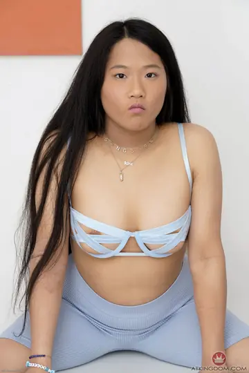 Thai BBW Strips Naked and Poses to Show Her Shaved Pussy