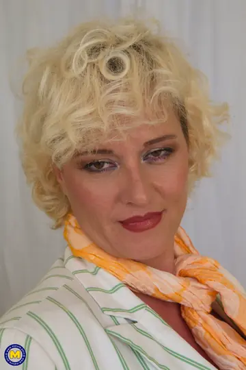 Mature European Blonde in Stockings Strips and Masturbates