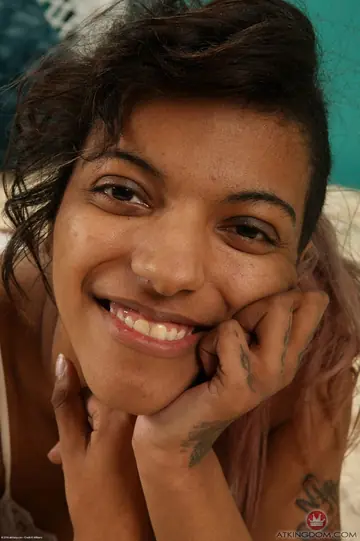Slim Ebony Woman Spreads Her Hairy Pussy and Shows Her Tattooed Feet