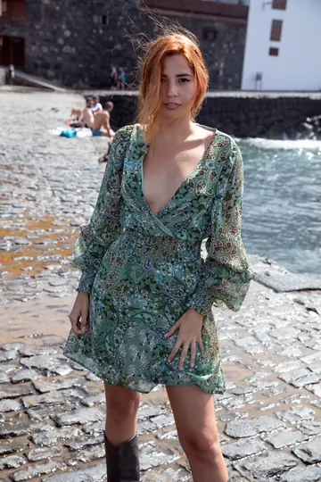 Latina Redhead Lifts Her Dress and Flashes on the Beach