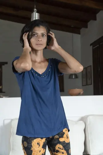 Mature Skinny Woman Strips Out of Her Shorts and Shows Her Hairy Pussy