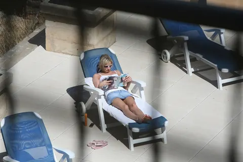 Paris Pink: German MILF Rides a Stranger by the Pool – photo 4 of 21