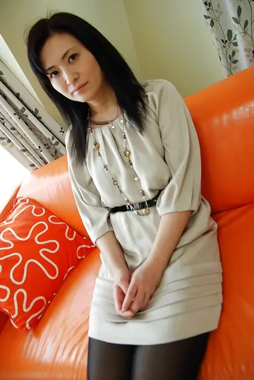 Busty Japanese MILF Undresses and Teases with a Vibrator