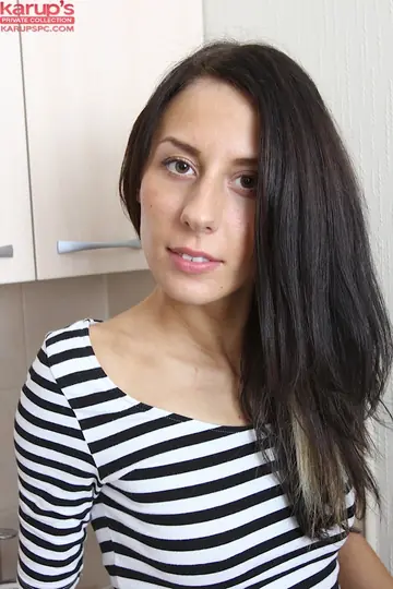 Slim Brunette in Stockings Bares Her Hairy Pussy in the Kitchen