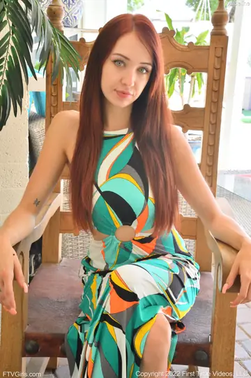 Busty Redhead Flaunts Her Ass and Toys Her Pussy with a Dildo