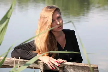 Woman Strips Out of Her Jeans and Spreads on a Dock Bench