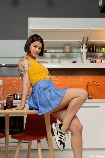 Sasha X Ray – Short-Haired Brunette Lifts Her Skirt and Spreads in the Kitchen