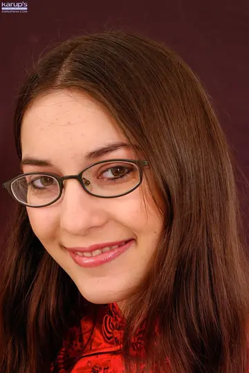 Larisa Fox – Busty Brunette in Glasses Shows Off Her Trimmed Pussy