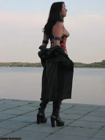 Thick Busty Woman Models Fetish Lingerie and Bondage Outdoors