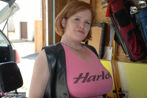 Misha Milf: Curvy Redhead MILF Bares Her Big Tits on Motorcycle – photo 10 of 20