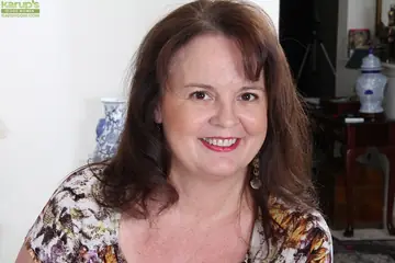 Felicia McDonald – Mature Brunette with Big Natural Tits Strips Out of Her Skirt