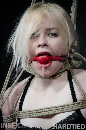 Pale Blonde Hogtied in Lingerie Outdoors