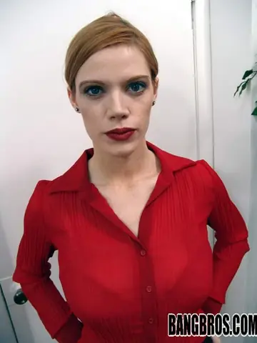 Roxetta – Busty Redhead MILF Gets Fingered for a Facial in the Office