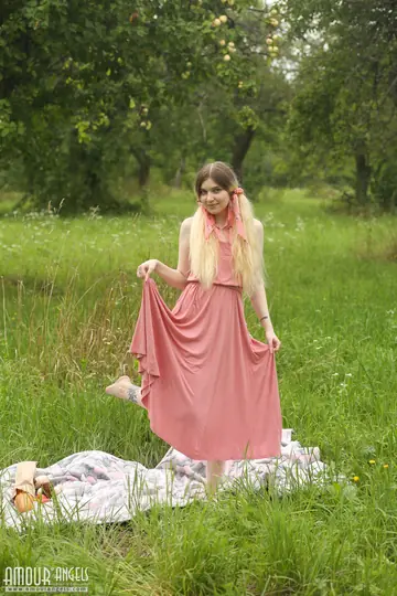 Blonde Strips Out of Her Skirt and Spreads on a Blanket Outdoors