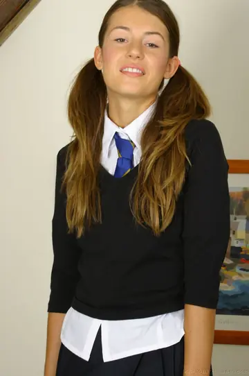 Brunette in Pigtails Strips Out of Her Uniform and Panties