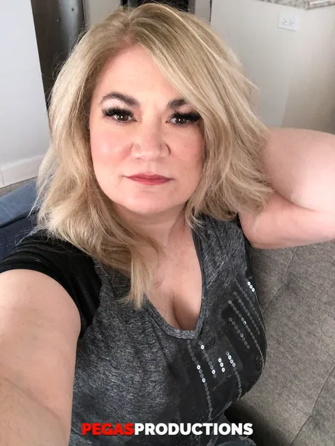 Busty MILF Teases Two Men on the Sofa – photo 12 of 16
