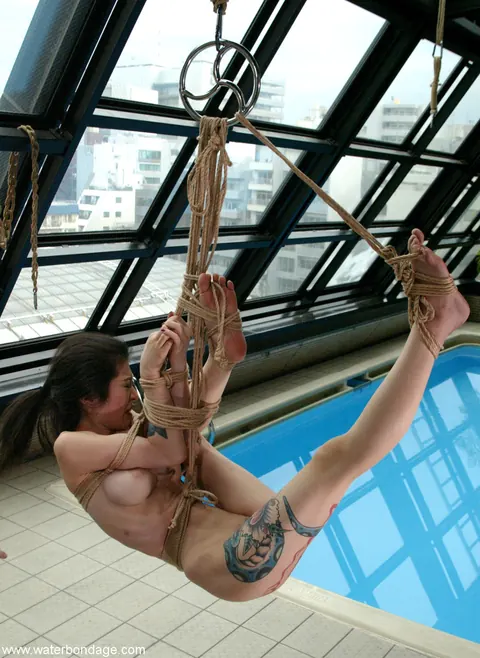 MILF in Bondage Poses Nude by the Pool – photo 14 of 21
