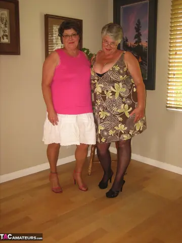 Two BBW Women Kiss and Finger in Skirts and Stockings