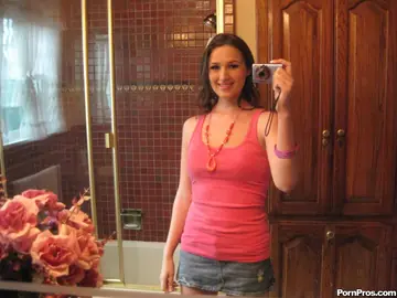 Judy Marie – Brunette Strips Out of Her Bikini and Skirt in the Bathroom Mirror