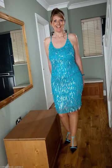 MILF in Stockings Shows Her Big Tits and Spreads Her Pussy