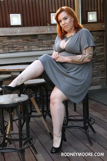 Redhead BBW Flaunts Her Tattooed Curves and Massive Tits Outdoors