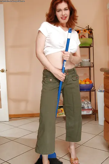 Mae Victoria – Redhead MILF in Heels Strips and Uses a Dildo