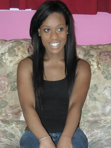 Petite Ebony Beauty Poses Fully Clothed Outdoors