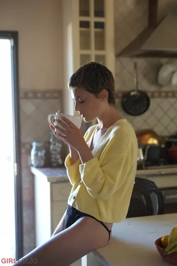 Skinny Short-Haired Brunette Strips Out of Her Lingerie in the Kitchen