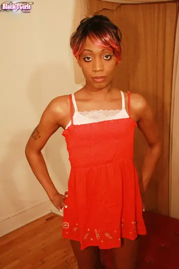 Ebony Trans Woman Strips Nude, Reveals Cock and Poses for Camera