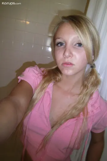 Blonde with Big Tits Spreads Her Shaved Pussy in a Selfie