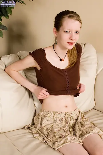 Slim Blonde with Big Natural Tits Strips Nude