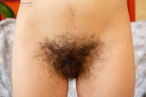 Nerdy Brunette with Glasses Shows Her Hairy Armpits and Pussy – photo 20 of 21
