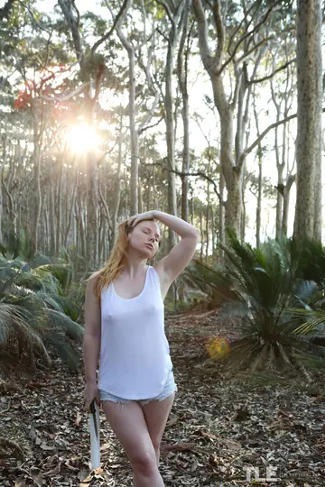 Madison Missina – Redhead Bound to a Tree in Plastic Wrap Outdoors