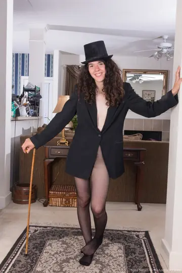 Silki Smith – Slim Brunette Strips Off Her Pantyhose to Show Her Hairy Pussy