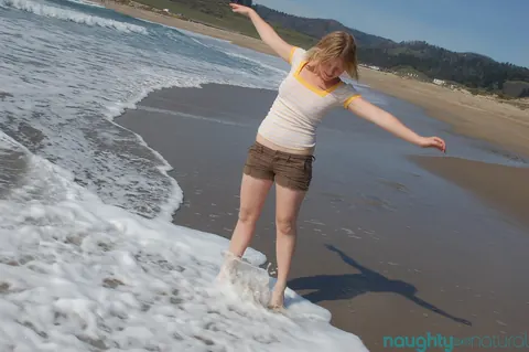 Eve Kisa: Short-Haired Blonde Amateur Shows Her Big Tits and Hairy Pussy on the Beach – photo 5 of 20
