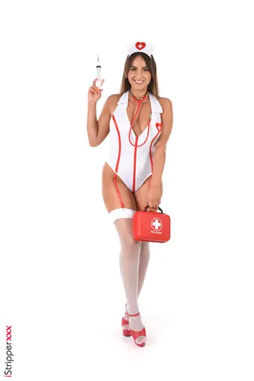 Busty Brunette Nurse in High Heels Spreads Her Shaved Pussy