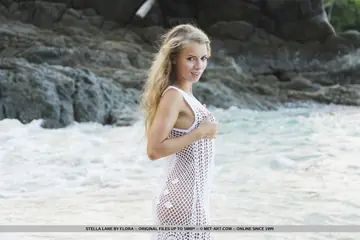 Stella Lane – Slim European Blonde Bares Her Pussy on the Beach