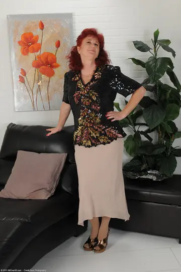 Mature Redhead in Stockings Spreads Her Legs Wide