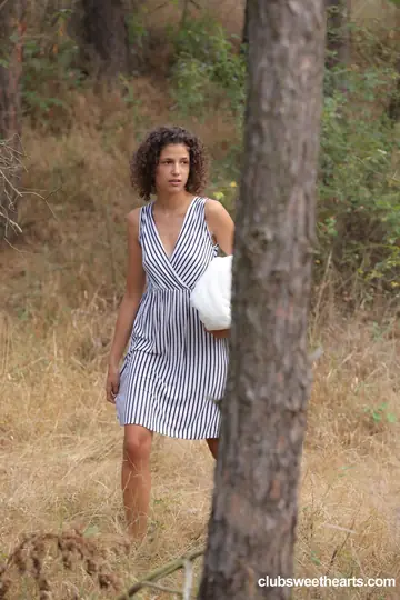 Bunny Love – Curly European Brunette Lifts Her Dress to Finger Her Pussy in the Forest